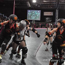 The Los Angeles Derby Dolls take on the San Diego Derby Dolls at TwentyWonder 2011. Photo by F. Palmer of The Owl Mag.